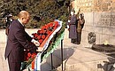 President Putin laying a wreath at the Monument to the Unknown Soldier.