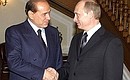 С премьер-министром Италии Сильвио Берлускони.