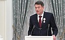 Presentation of state decorations in the Kremlin. Andrei Karpin, Director General of the National Medical Radiology Research Centre, Ministry of Healthcare, receives the Order of Pirogov.