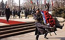 President Putin laying a wreath at the Monument to the Unknown Soldier.