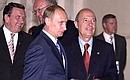 President Putin with Greek Prime Minister Konstantinos Simitis visiting the museum. In the background — German Chancellor Gerhard Schroeder (left) and Swedish Prime Minister Goran Persson.