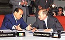 President Vladimir Putin with Italian Prime Minister Silvio Berlusconi during a morning meeting of the G8 summit at the Doge\'s Palace (Palazzo Ducale).