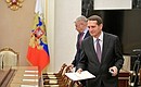 Interior Minister Vladimir Kolokoltsev and Director of the Foreign Intelligence Service Sergei Naryshkin, right, before a meeting with permanent members of the Security Council.