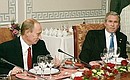 With U.S. President George W. Bush at a working lunch for the G8 heads of state and government.
