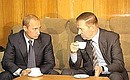 President Putin talking with Ukrainian President Leonid Kuchma.