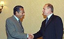 С Премьер-министром Малайзии Махатхиром Мохамадом.