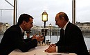 С Председателем Правительства Владимиром Путиным. Во время неформального ужина.