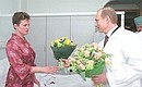 President Putin visiting the Burdenko military hospital. He gave flowers to a woman wounded in the terrorist attack in Grozny in December 2002.