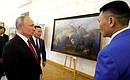 Vladimir Putin visited an art exhibition marking the 80th anniversary of the victory in the Battle of Khalkhin Gol.