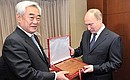 President of the World Taekwondo Federation Dr Chungwon Choue presented Vladimir Putin with the belt and diploma conferring on him an honorary 9th dan in the Korean traditional martial art of taekwondo.