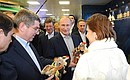 During visit to exposition of Russian regions at the Olympic Park. With President of the International Olympic Committee Thomas Bach (left) and Khanty-Mansi Autonomous Area Governor Natalya Komarova.