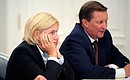 At the meeting on the draft federal budget for 2013–2015. Deputy Prime Minister Olga Golodets and Chief of Staff of the Presidential Executive Office Sergei Ivanov.