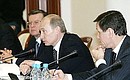 At the session of the Council for the Development of Physical Culture and Sport, Excellence in Sports, and the Preparation and Execution of the 2014 XXII Olympic Winter Games and XI Paralympic Winter Games in Sochi. With Prime Minister Viktor Zubkov (left) and Deputy Prime Minister Aleksandr Zhukov.