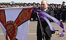 Vladimir Putin presents the Order of Kutuzov to the 393rd Air Force base.