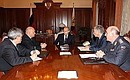 President Vladimir Putin with Moscow Mayor Yury Luzhkov, Georgy Poltavchenko, presidential envoy to the Central Federal District, Interior Minister Boris Gryzlov and Vladimir Pronin, the Moscow chief of police.