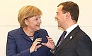 With Federal Chancellor of Germany Angela Merkel. 