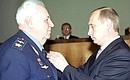 President Putin decorating former Air Force Commander-in-Chief (December 1984 — July 1990) and Deputy Defence Minister of the USSR Air Marshal Alexander Yefimov with the Order of Courage.