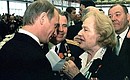President Putin with pilot and Hero of the Soviet Union Anastasia Popova during an official reception to mark the 55th anniversary of the USSR\'s victory in the Great Patriotic War.
