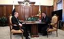 With Governor of Primorye Territory Vladimir Miklushevsky.