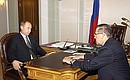 С главой Комитета по финансовому мониторингу Виктором Зубковым.