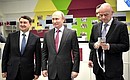 During a visit to the 2018 FIFA World Cup FAN ID Distribution Centre. With Presidential Aide Igor Levitin and FIFA President Gianni Infantino (right).