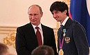 Presenting state decorations to London Paralympic Games champions and medallists. Order of Friendship presented to XIV Paralympic Games champion Zaurbek Pagayev.