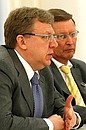 At a meeting with members of the Government. Deputy Prime Minister and Finance Minister Alexei Kudrin, and Deputy Prime Minister Sergei Ivanov.