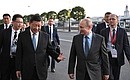 С Председателем Китайской Народной Республики Си Цзиньпином во время прогулки по Северной столице.