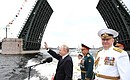 Main Naval Parade. The Supreme Commander-in-Chief made the rounds of a parade line-up of military ships in the Neva harbour and saluted the crews from the deck of a naval cutter.