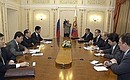 President Putin meeting with the Chinese Foreign Minister.