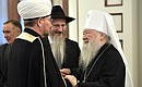 Before the Council meeting. From left: Chairman of the Council of Russian Muftis Ravil Gaynutdin, Chief Rabbi of Russia Berel Lazar and Metropolitan Juvenaly.