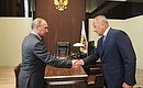 С председателем Внешэкономбанка Владимиром Дмитриевым.