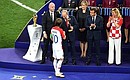 The awards ceremony of the 2018 FIFA World Cup Russia. Vladimir Putin presents the FIFA World Cup 2018 Golden Ball to Luka Modric (Croatia) named the best player of the tournament. Photo: RIA Novosti