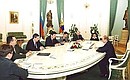 President Vladimir Putin meeting with spokesmen of the Union of Right Forces group of the State Duma.