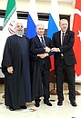 С Президентом Ирана Хасаном Рухани (слева) и Президентом Турции Реджепом Тайипом Эрдоганом.