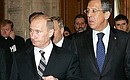 Before the beginning of a meeting of the Russia-NATO Council. With Russian Foreign Minister Sergei Lavrov.