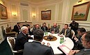 At a meeting with Prime Minister of Ukraine Nikolai Azarov.