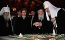 With Ecumenical Patriarch Bartholomew I of Constantinople and Patriarch Kirill of Moscow and All Russia during visit to the Kronstadt Naval Cathedral.