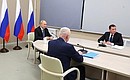 At a videoconference meeting on the development of core communities in the Russian Arctic. With Governor of Arkhangelsk Region Alexander Tsybulsky (right) and Presidential Plenipotentiary Envoy to the Northwestern Federal District Alexander Gutsan.