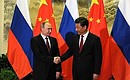 Перед началом российско-китайских переговоров. С Председателем Китайской Народной Республики Си Цзиньпином.