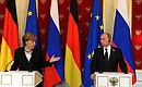 News conference following Russian-German talks. With Federal Chancellor of Germany Angela Merkel.