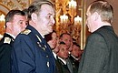Mr Putin presented the epaulets of general of the army to Anatoly Kornukov, commander-in-chief of the Russian Air Force.
