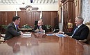 With Minister of Agriculture Dmitry Patrushev (left) and the Head of the Federal Service for Veterinary and Phytosanitary Supervision (Rosselkhoznadzor) Sergei Dankvert.