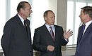 President Putin with French President Jacques Chirac, left, and Russian Defence Minister Sergei Ivanov at the Main Space Test and Control Centre.