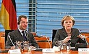 С Федеральным канцлером Германии Ангелой Меркель на встрече с представителями германских деловых кругов.