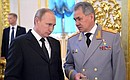 Reception in honour of military academy graduates. With Defence Minister Sergei Shoigu.