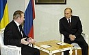 Vladimir Putin and Leonid Kuchma discussed the political situation in Ukraine.