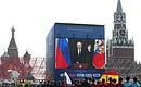 Speaking via video linkup, Vladimir Putin greeted people attending a ceremony launching the countdown from 1000 days until the 2018 FIFA Football World Cup begins in Russia. Photo: TASS