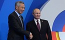 With Prime Minister of Singapore Lee Hsien Loong. Photo: russia-asean20.ru