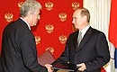 President Putin with President Vladimir Voronin of Moldova during the signing of a joint statement on cooperation.